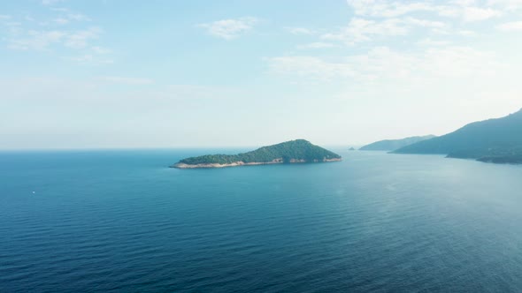 Drone Flying Over Beautiful Blue Sea with Waves