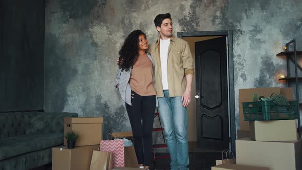 Couple Moving Into New Flat