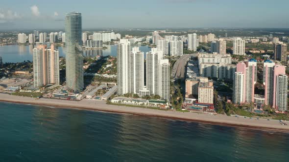  Aerial View of Beautiful Tropical City Skyline. Buildings with Ocean View