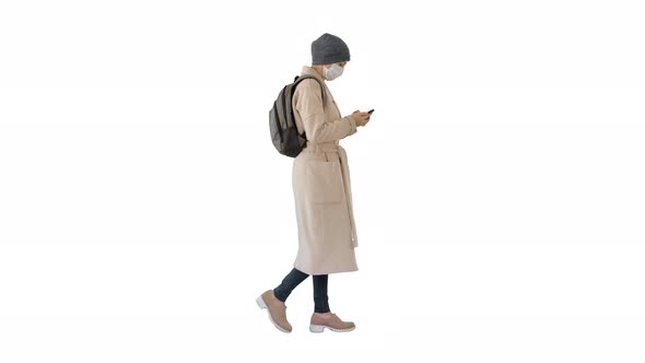 Female Wearing Medical Mask Walking on White Background