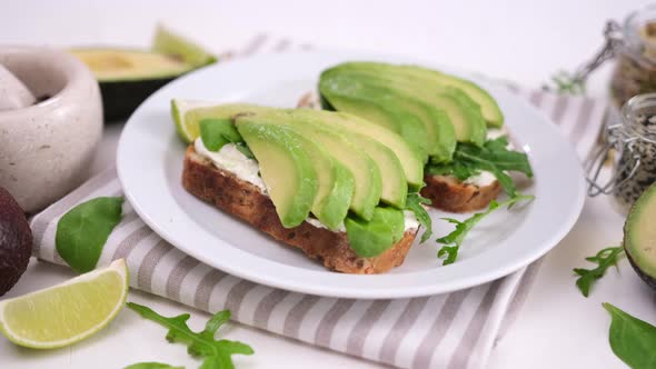 Healthy Breakfast or Snack  Soft Cheese and Avocado Sandwich on a Plate