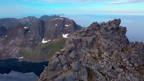 Man and Woman at the Top of the Mountain