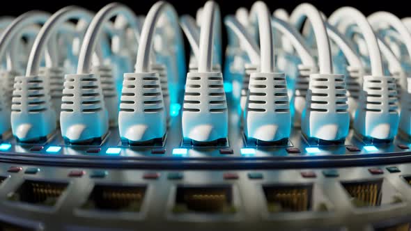 Countless white ethernet cables in a  server cabinet lit by a single spotlight.