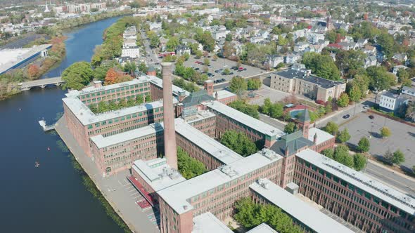 Aerial Drone Shot Flying past Watch Factory in Waltham Mass with Kayakers