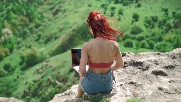 Woman Writer is Typing on Laptop Stunning Landscape