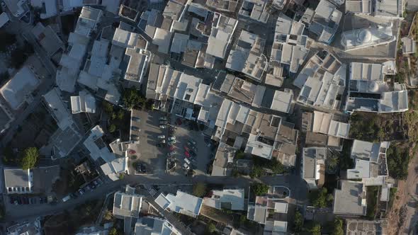 Overhead Top Down Birds View Aerial of Small Town on Island