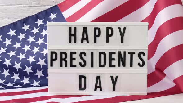 Waving American Flag Background Lightbox with Text HAPPY PRESIDENTS DAY Flag of the United States of