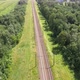 Train Way, Railroad tracks Through Green Grassed Countryside, Aerial. - VideoHive Item for Sale