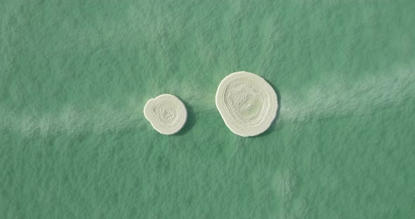 Aerial view of circle salt formation in the water, Dead sea, Negev, Israel.