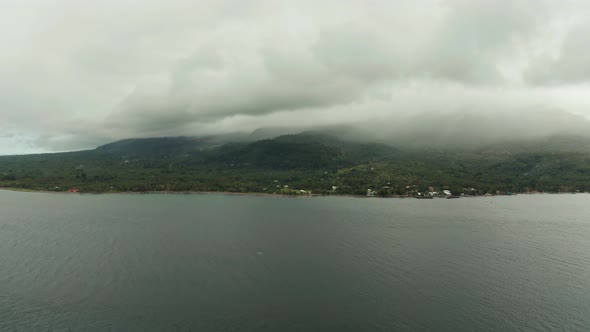 Tropical Island Covered with Clouds Philippines Camiguin