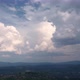 Aerial time lapse of developing storm clouds, over hills - VideoHive Item for Sale