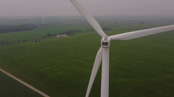 Close Up Of A Wind Turbine Rotating At The DTE Wind Farm In Gratiot County, Ithaca, Michigan. drone