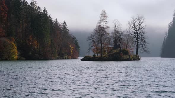 Autumn misty morning lake Konigssee, Bavaria, Germany