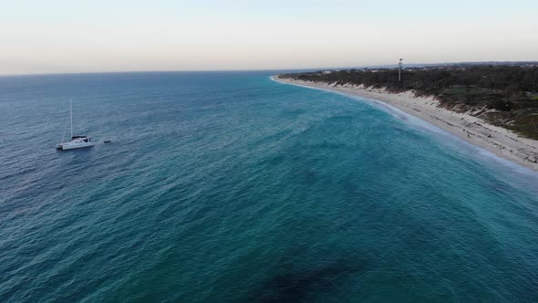 Aerial view of a Boat by a Beach