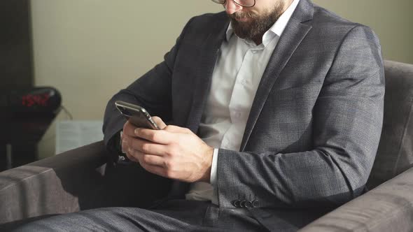 Closeup Video of Business Man with Mobile Phone