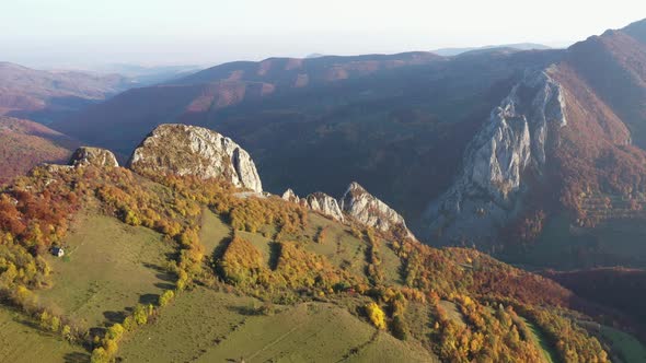 Flying Above Colorful Autumn Countryside Forest in the Mountains