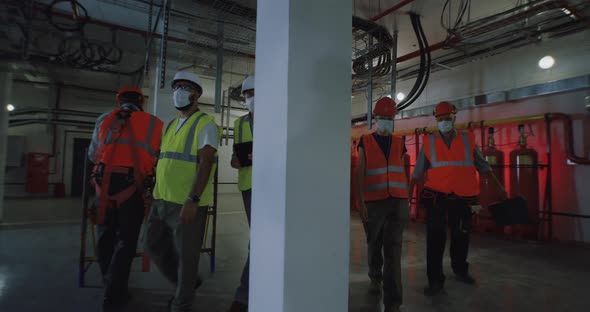 Engineers in Masks During Power Plant Inspection