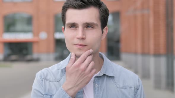 Outdoor Young Man Thinking New Idea