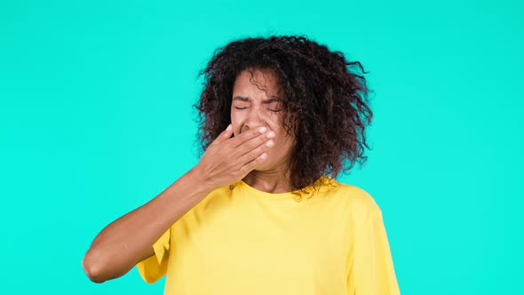 Tired Sleepy African Woman Yawns Covers Her Mouth with Hand