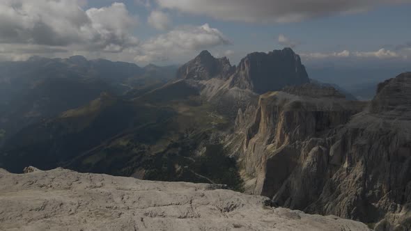 Aerial view of Dolomites in Val Gardena, Italy. Astonishing panorama, high mountain peaks with sky a