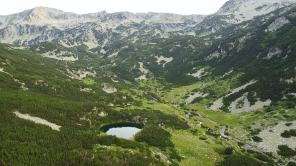 Aerial View of a Lake in the Pirin Mountains with Blue Clear Water