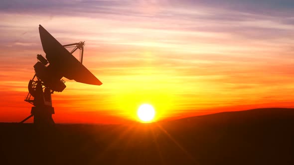 Radio Telescope Explores Evening Sky Against Scenic Sunset
