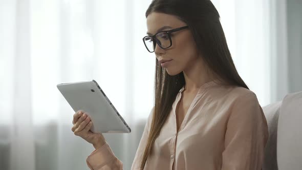 Elegant Lady in Glasses Analysing Email Letters, Checking Inbox Folder on Tablet