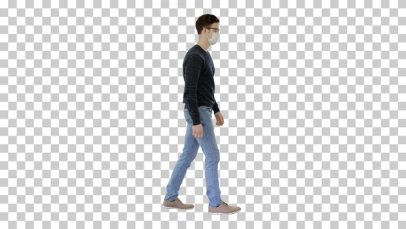 Young handsome man walking with medical mask on, Alpha Channel