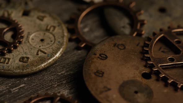 Rotating stock footage shot of antique and weathered watch faces