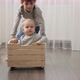 Two brothers playing and riding in wooden toy box. - VideoHive Item for Sale