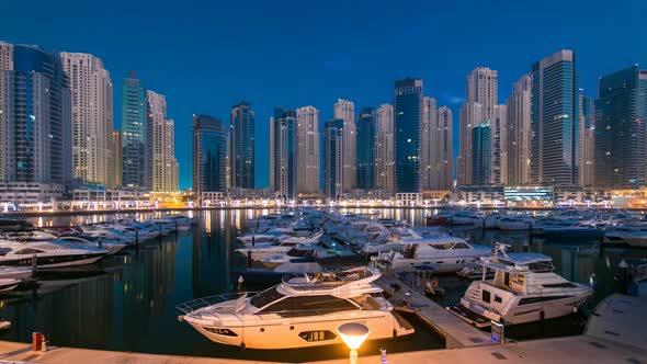 Dubai Marina at Blue Hour Night to Day Timelapse with Yachts