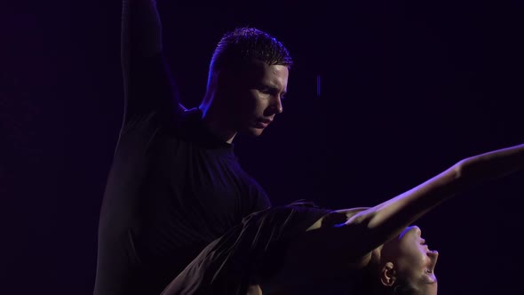 Passionate Bachata Dance Among the Raindrops Performed By a Young Sensual Couple of Dancers