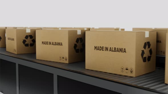 Boxes with MADE IN albania Text on Conveyor