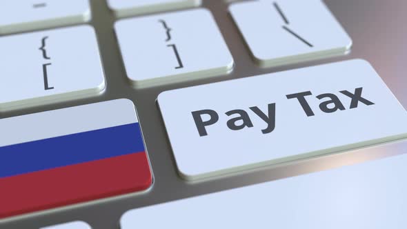 PAY TAX Text and Flag of Russia on the Computer Keyboard