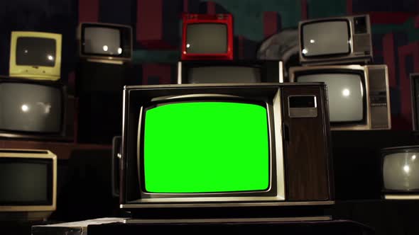 Old TV Green Screen in the Middle of Many TVs. 4K Version.