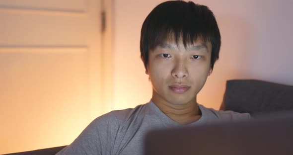 Man Using Computer at Home 