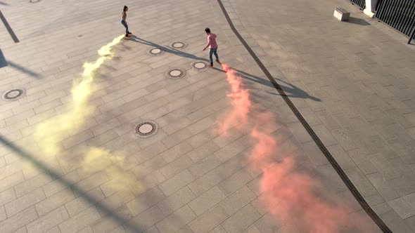 Couple Rollerblading in the Street.