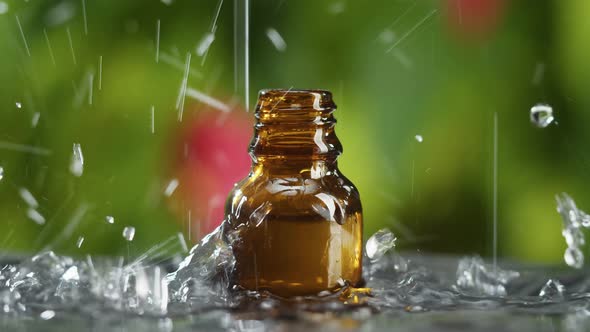 Drops Falling Into Bottle in Water Closeup Raining