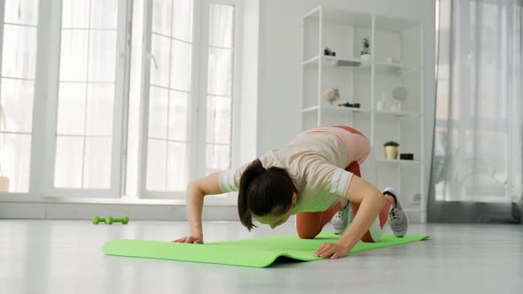 A Fitness Trainer Conducts an Online Workout