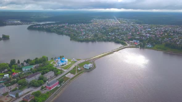 Top View of City with River and Dam