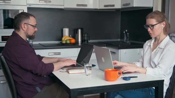 A Young Couple Man Woman Freelancers Remote Employees Working From Home