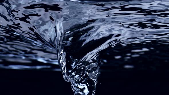 Super Slow Motion Shot of Water Whirl Isolated on Black Background at 1000Fps