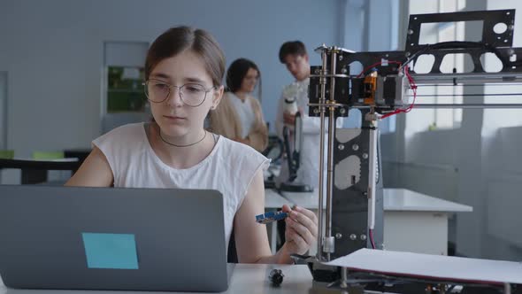 Close Up View of a Young Smart Girl in a Laboratory