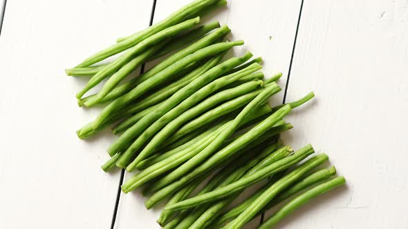 Fresh Green Bean Pods Placed on White Wooden Table