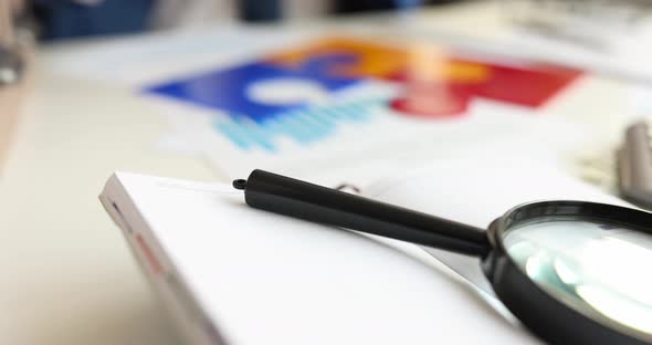 Businessman Putting Last Colorful Piece of Puzzle on Table  Movie