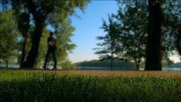 Sport People at Morning Park. Biking, Walking and Running.