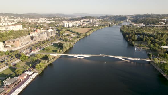 Pedro e Ines pedestrian bridge on Mondego river at Coimbra, Portugal. Aerial panoramic view