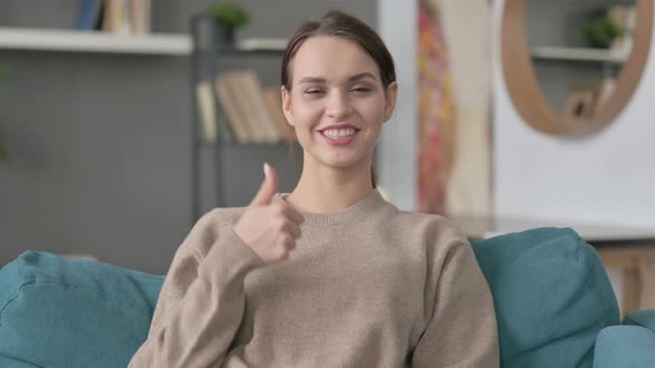 Portrait of Woman Showing Thumbs Up Sign