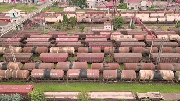 Drone, marshalling yard. there are a lot of railway cars there. depot. Trains .