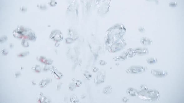 Closeup of flowing bubbles in water